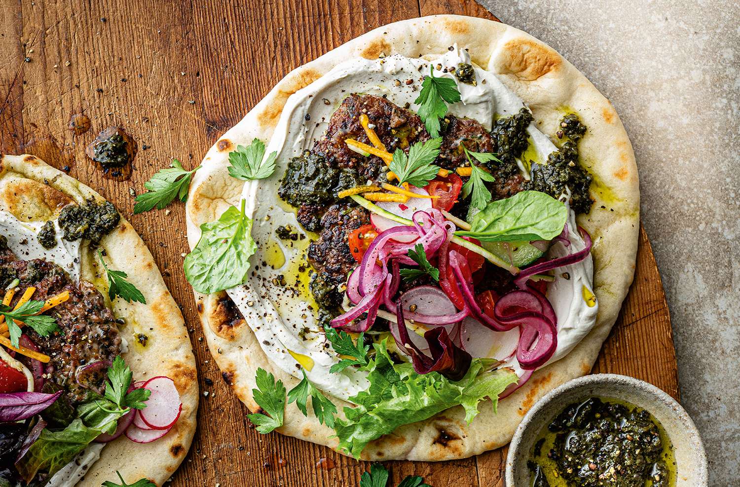 Lamb smash burger flatbreads with zhoug