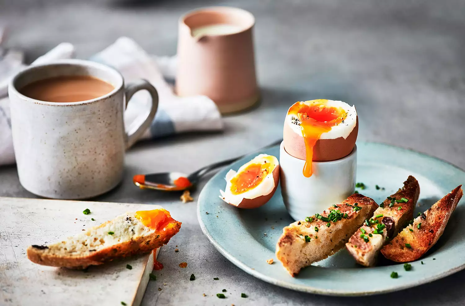 Soft egg with anchovy toasts