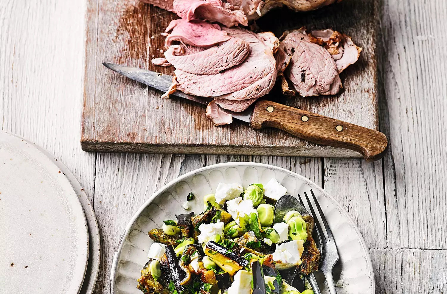 Greek lamb with broad beans, aubergine & feta