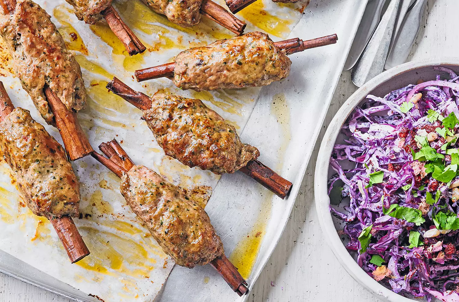 Greek lamb keftas on cinnamon skewers