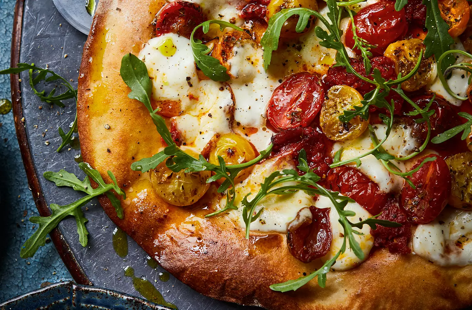 Spicy ’nduja, slow-roasted tomato & rocket pizza