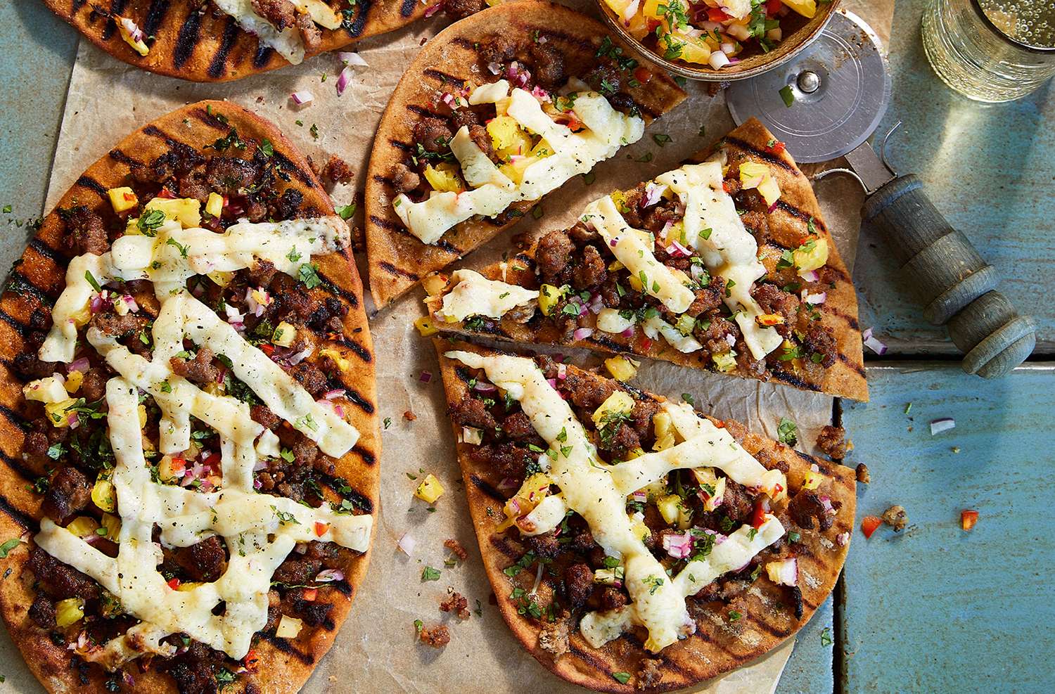 Sausage & pineapple salsa barbecued flatbreads