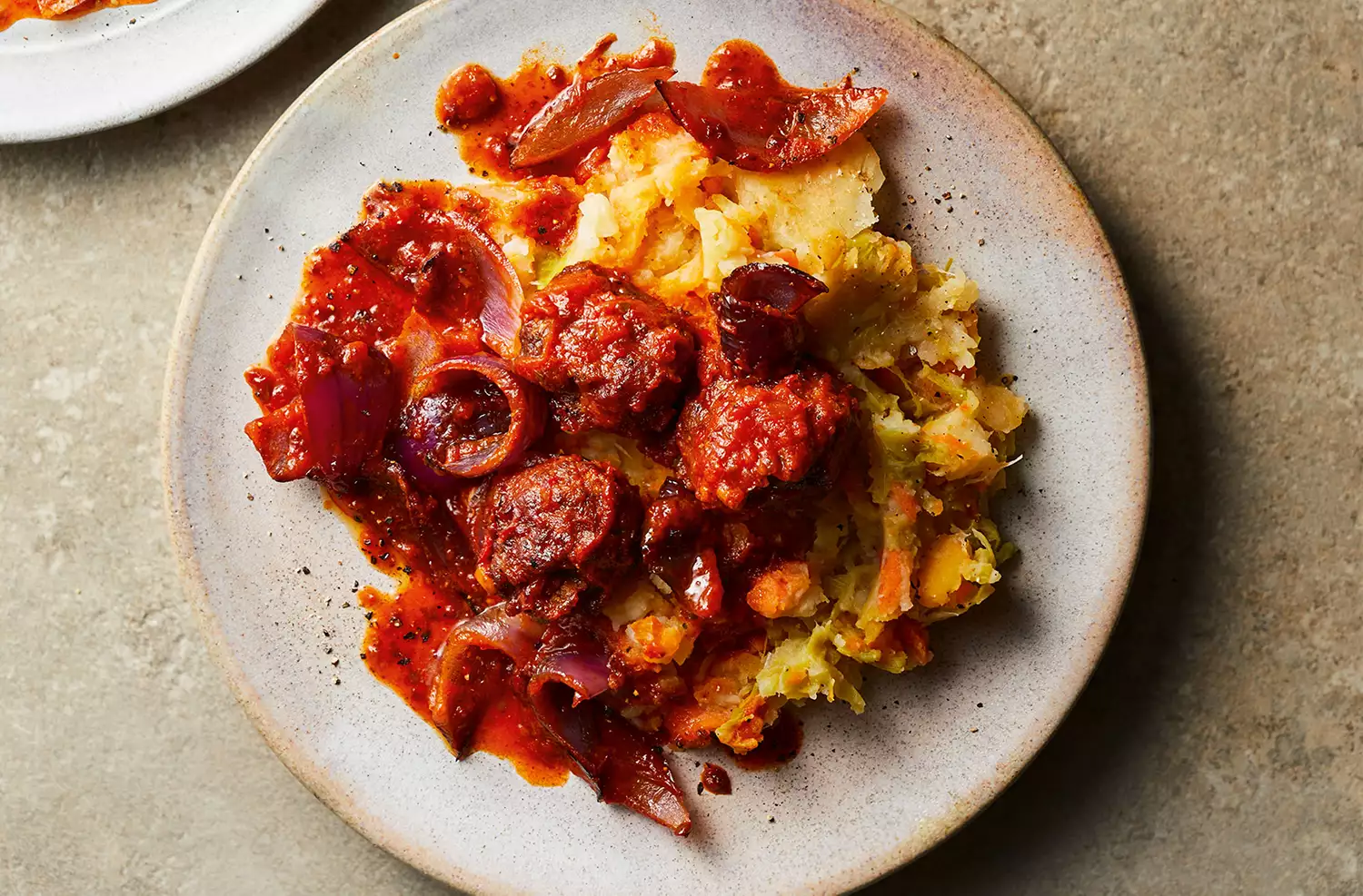 Meatballs with chilli tomato sauce & root veg crush