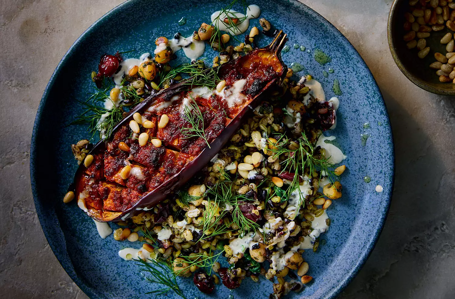 Harissa aubergine with freekeh, black rice & chickpeas